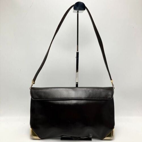 RARE, vintage, Dior, brown leather two-wy clutch/shoulder bag with a brown trotter print interior and accent that peeks through the front