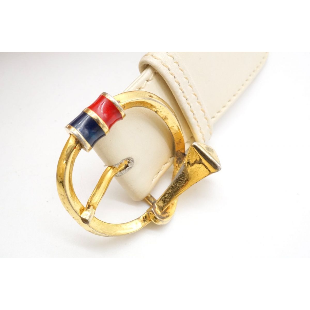 vintage, Gucci, size 80/32, white leather belt with a round, gold buckle with red and blue enamel & two braided leather strands