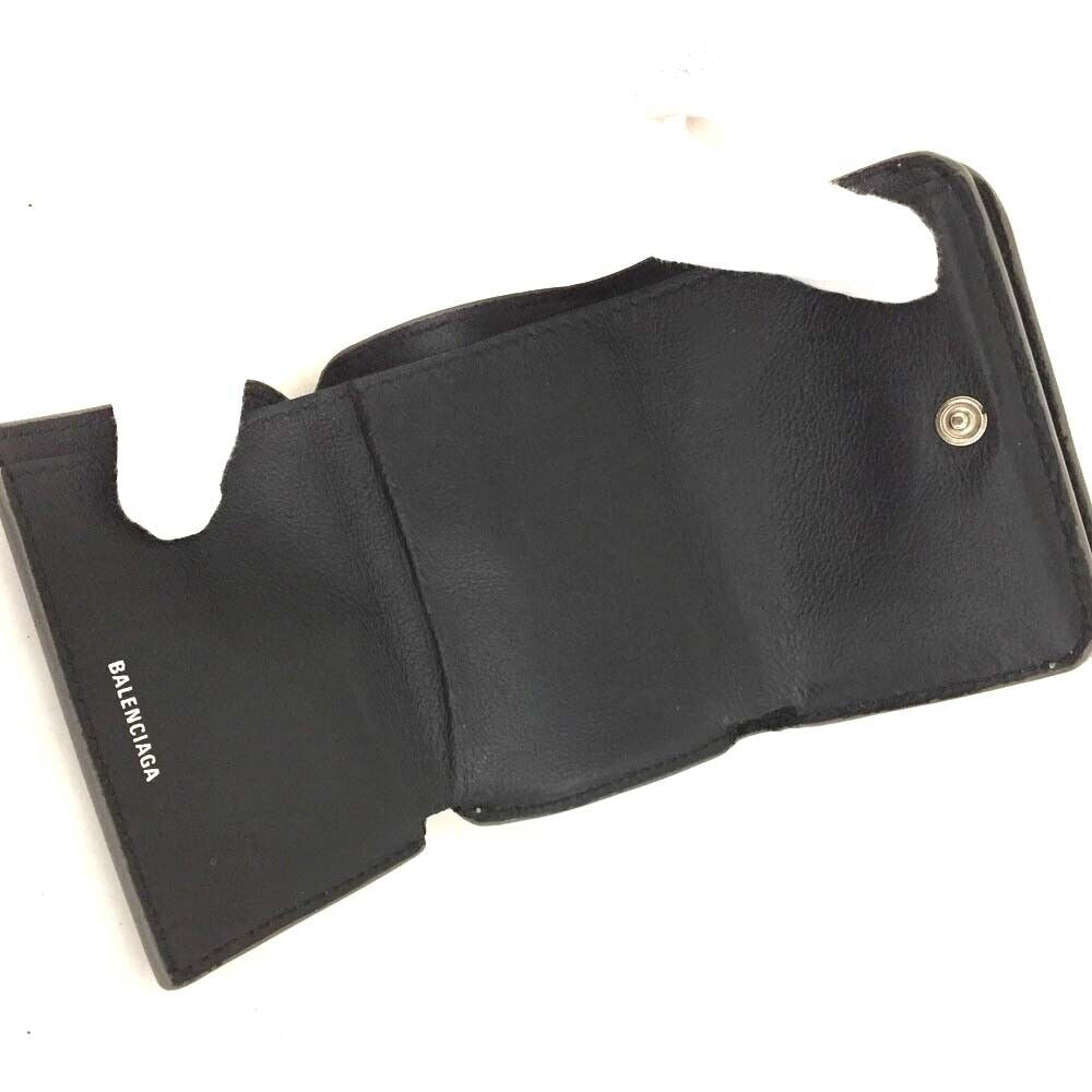 Balenciaga, gold leather wallet with two compartments and a snap close change purse & tri-fold wallet
