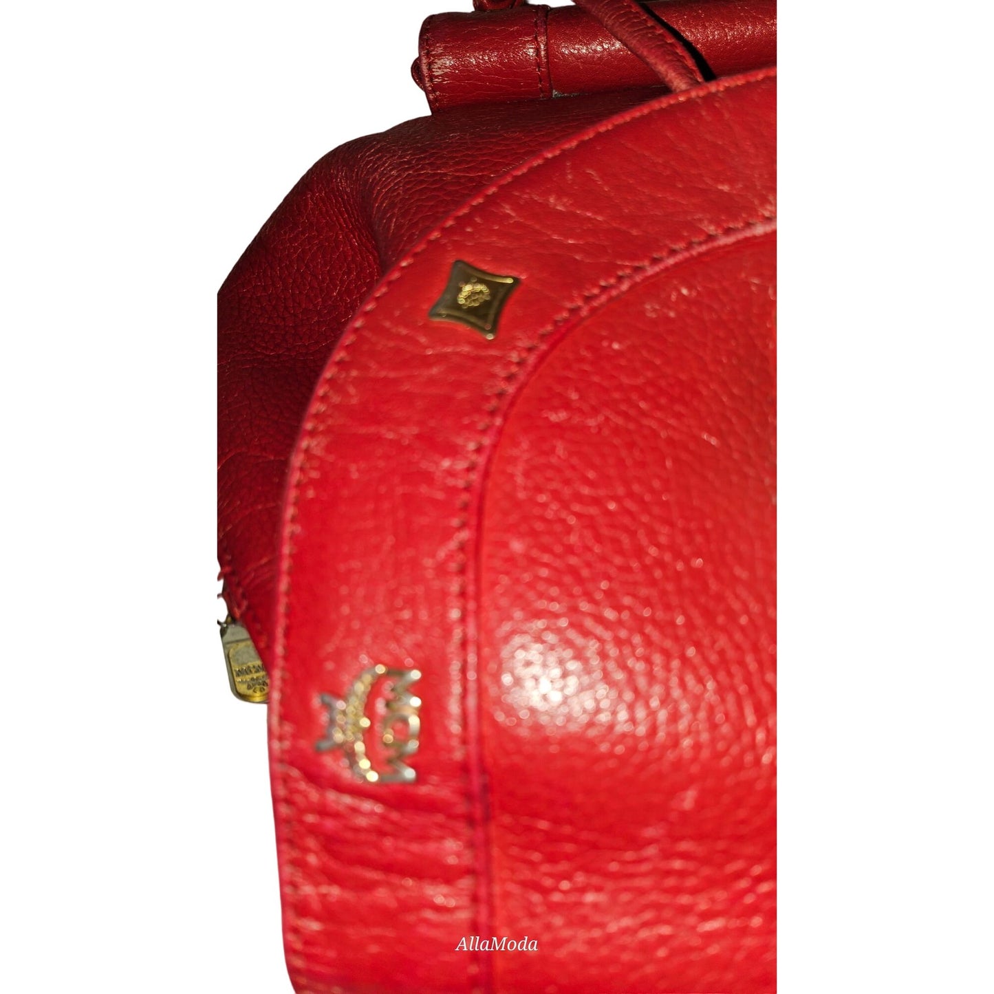 MCM vintage red leather backpack with gold hardware