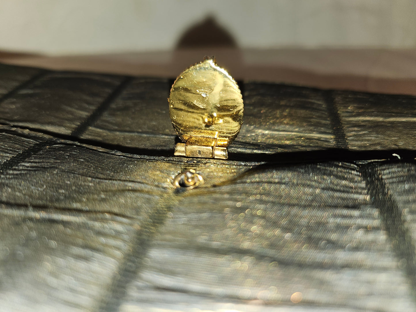 Gucci early black & gold silk taffeta with tiger's eye in 14K clasp