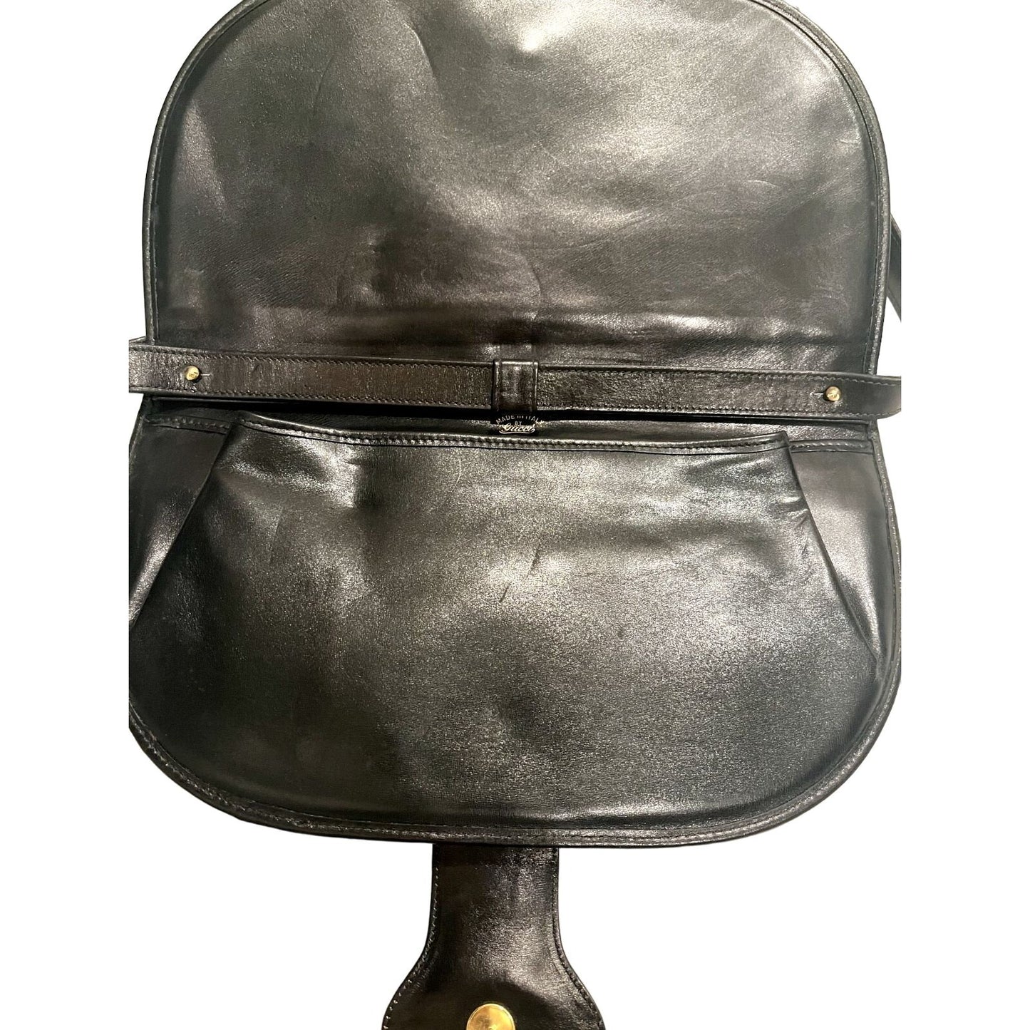 Vintage, rare, black leather, Gucci shoulder bag with a large, two-tone 'GG' emblem and removable strap