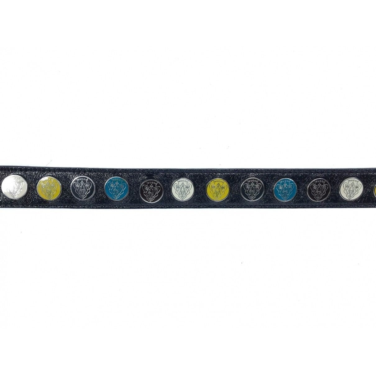 RARE, Gucci, black leather belt with a round, chrome, buckle, yellow, black, white & teal enamel & chrome engraved w the Gucci crest