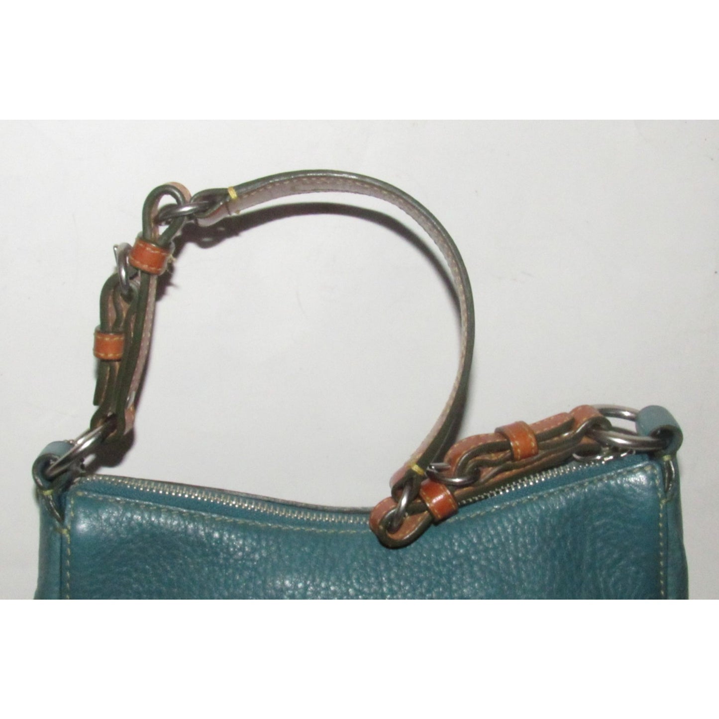 Coach, 'Chelsea' hobo, in a teal soft leather, hobo style purse with a brown, strap with unique chrome buckles