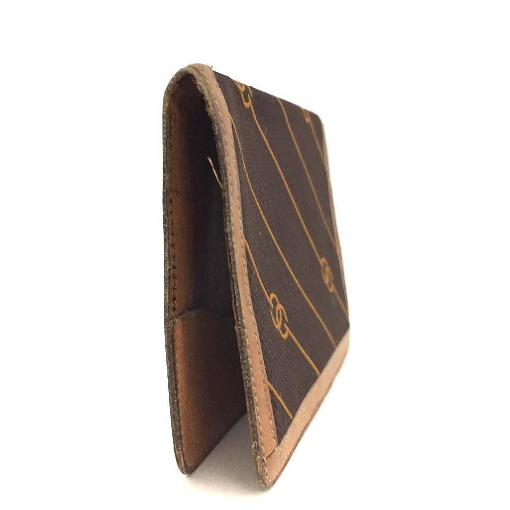 Early Gucci brown canvas with an orange diagonal GG logo print and camel leather bi-fold wallet