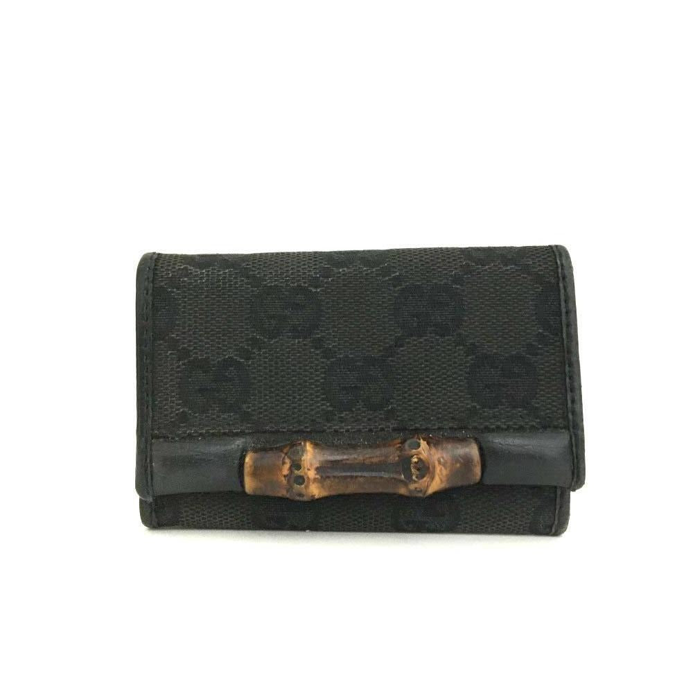 Gucci, black Guccissima print/leather, tri-fold, key holder/card holder, mini- wallet w bamboo accent & slots for your cards