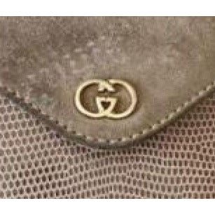Rare, Gucci, taupe lizard leather, bucket bag with a removeable long gold chain strap