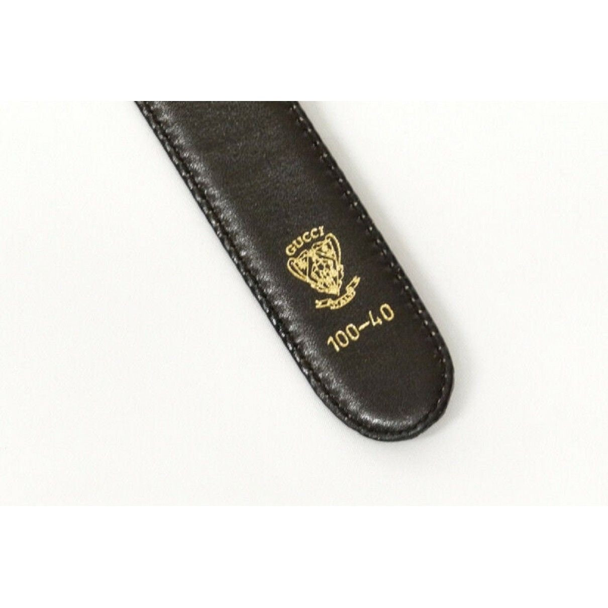 Vintage, Gucci, 44" long x 1.25" wide, brown or black leather, reversible belt in size 40" with a dual sided, two-tone engraved GG buckle