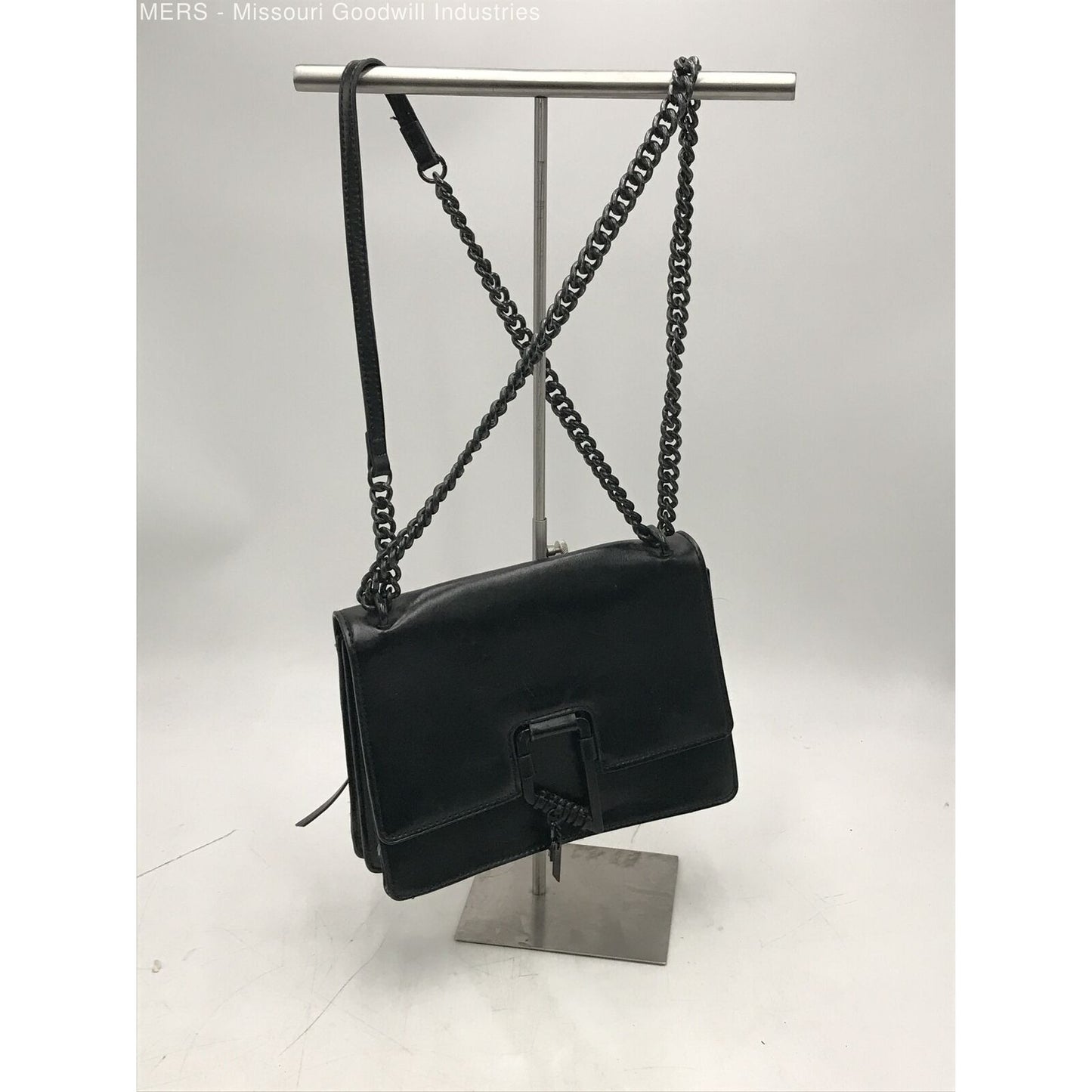 Foley & Corina, black leather, crossbody purse with an envelope top, a back zip pocket and lots of interior pockets.
