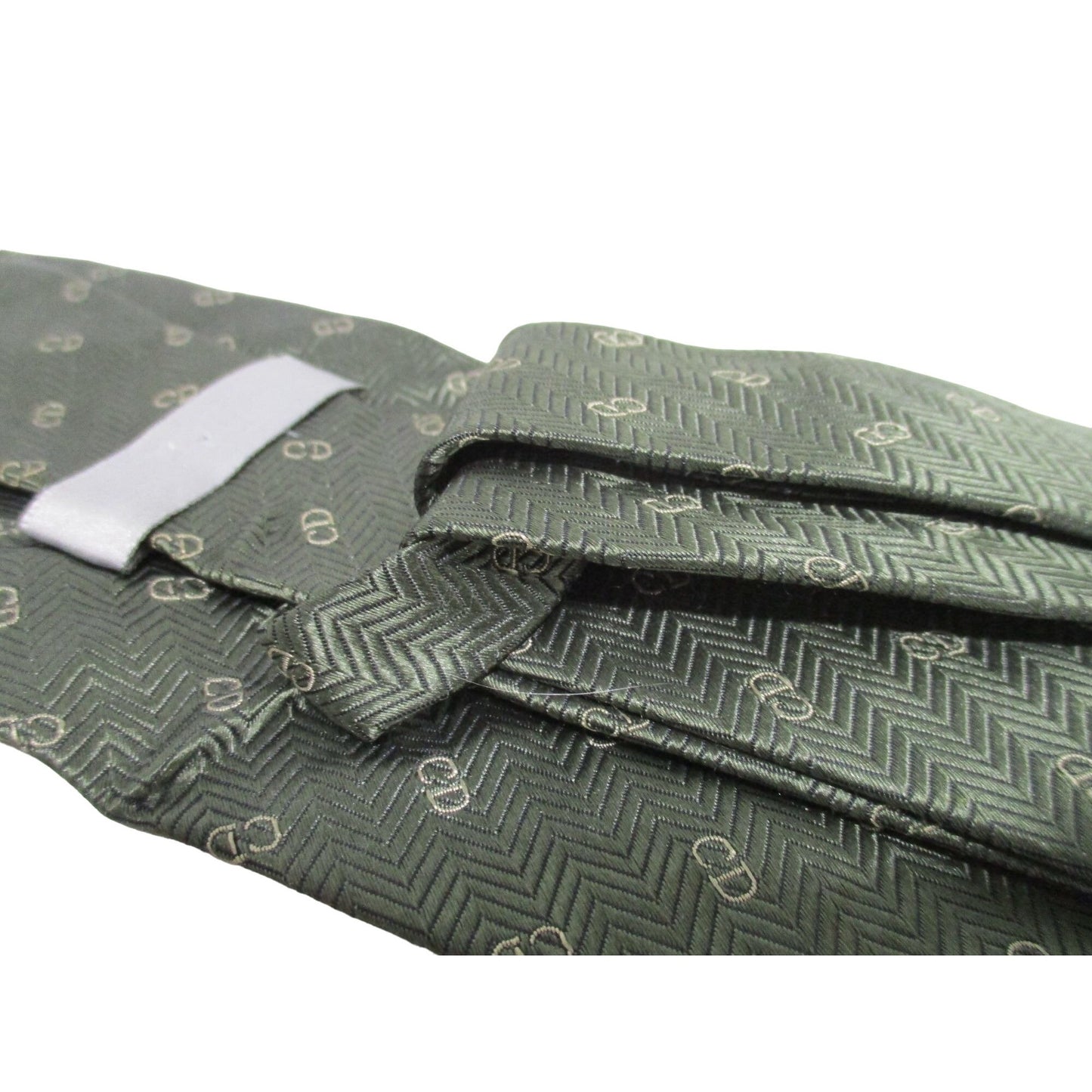 Vintage Christian Dior tie made of 100% textured, olive green silk with a logo print in shades of tan