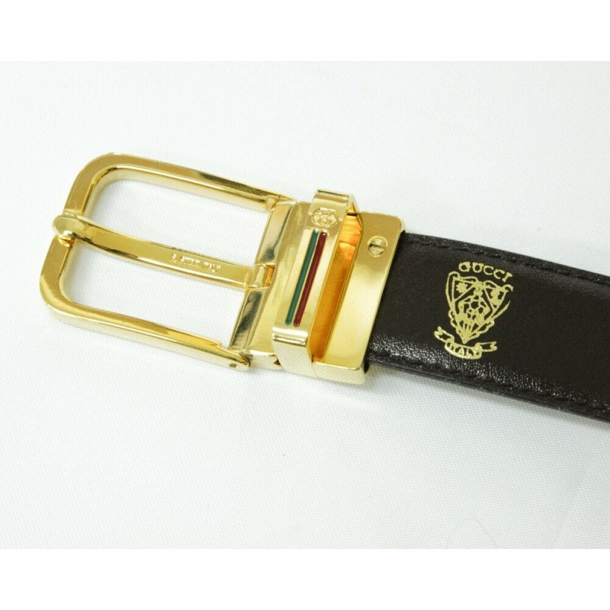 Vintage, NOS, Gucci, brown or black leather, 38" - 42", reversible belt with a removable, rectangular, gold tone buckle with red and green
