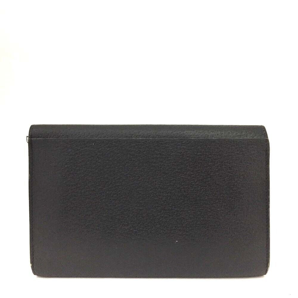 Unique, vintage, Gucci, RARE, black leather, clutch style purse or extra large wallet with a gold horse-bit accent at the clasp