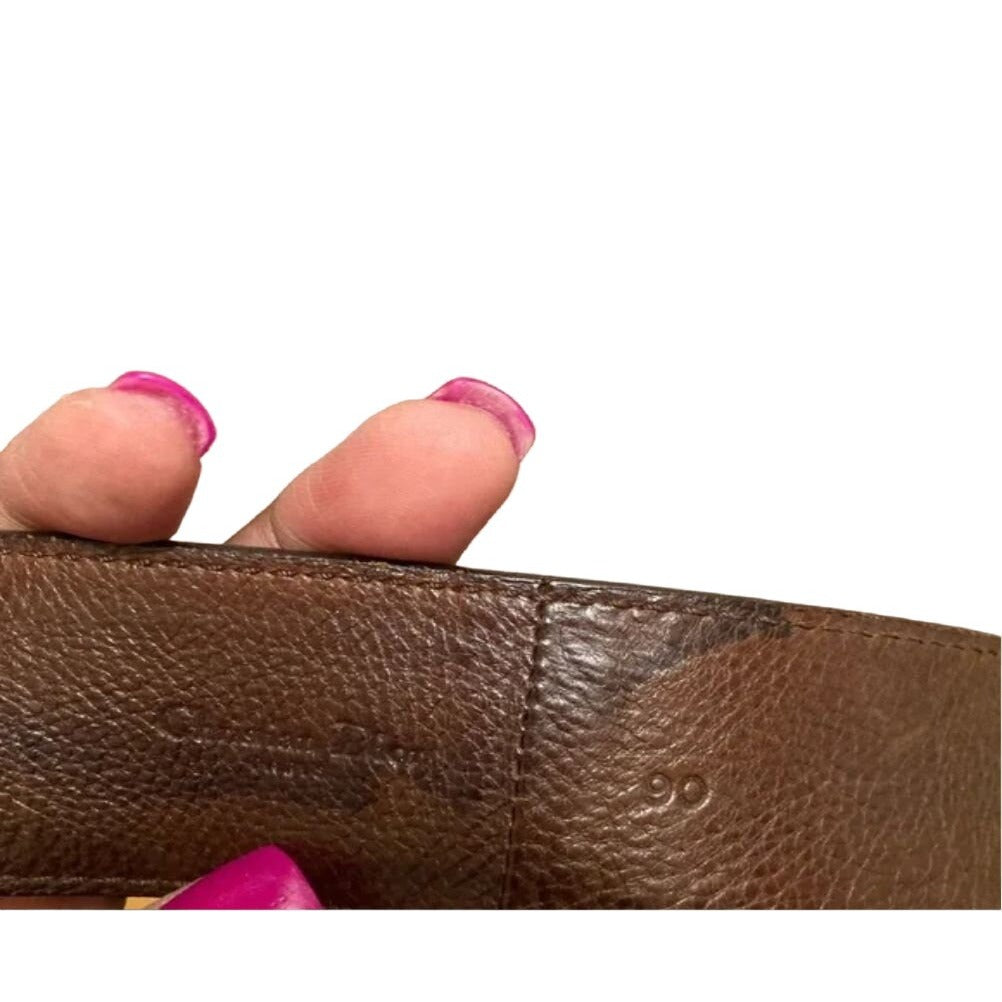 Christian Dior, brown textured leather belt and bold, gold tone metal, open 'D' logo buckle