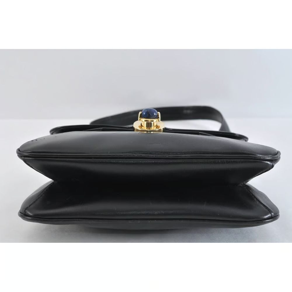 Unique 1960s Gucci mod, black leather, shoulder bag with a beautiful, blue, lapis lazuli accent on the clasp & bold gold hardware