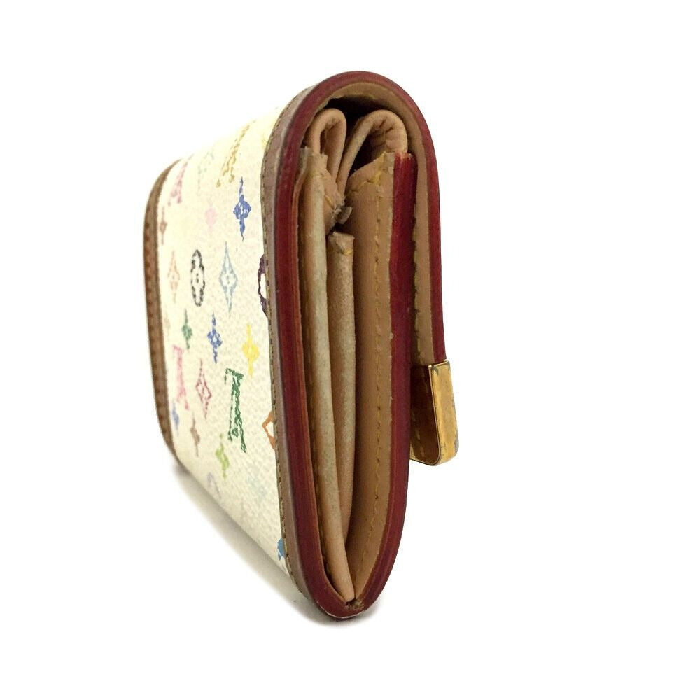 Vintage Louis Vuitton petite wallet with multi color logo print on white leather & lots of card slots