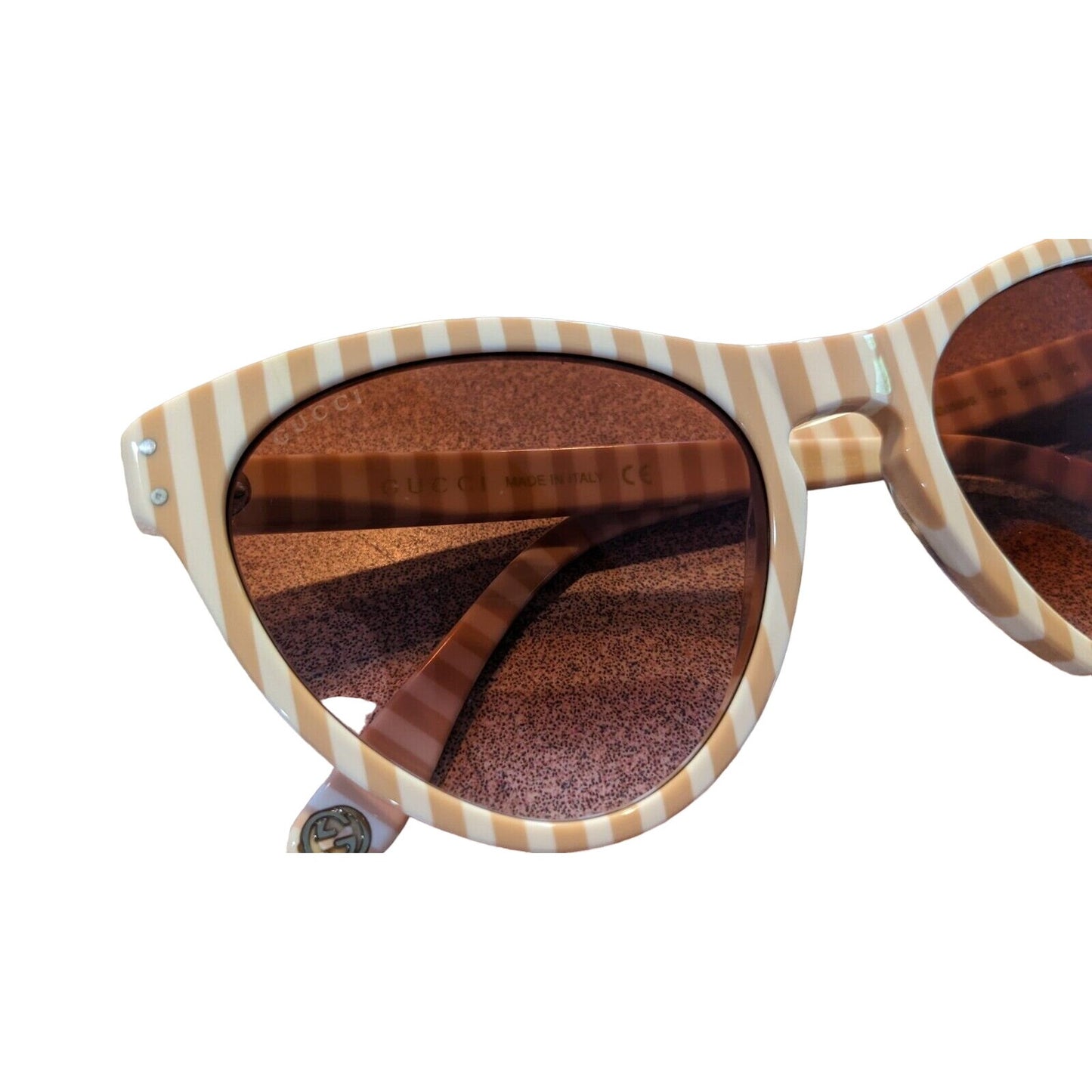 Gucci tan & white striped plastic cat's eye sunglasses