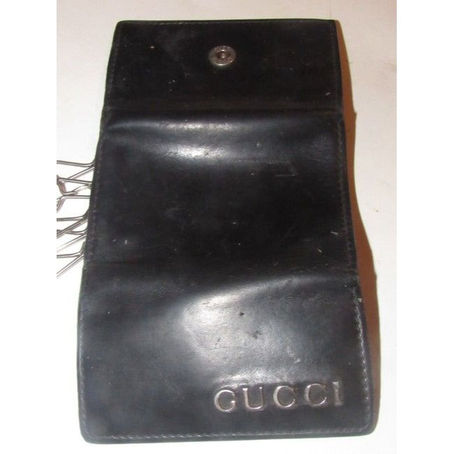 Gucci, black leather, snap close, tri-fold, key holder/card holder, mini- wallet w chrome accents & slots for your cards & six key holders