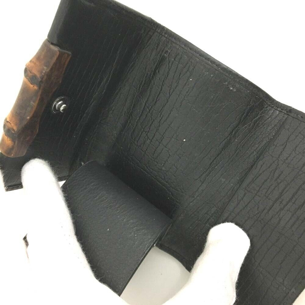 Gucci, black Guccissima print/leather, tri-fold, key holder/card holder, mini- wallet w bamboo accent & slots for your cards