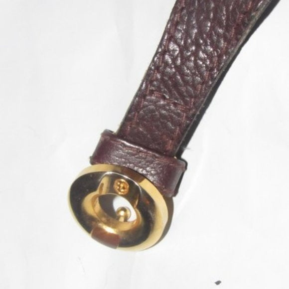 Early, vintage, Gucci, brown whip-stitched, leather belt with a round, gold & enamel buckle