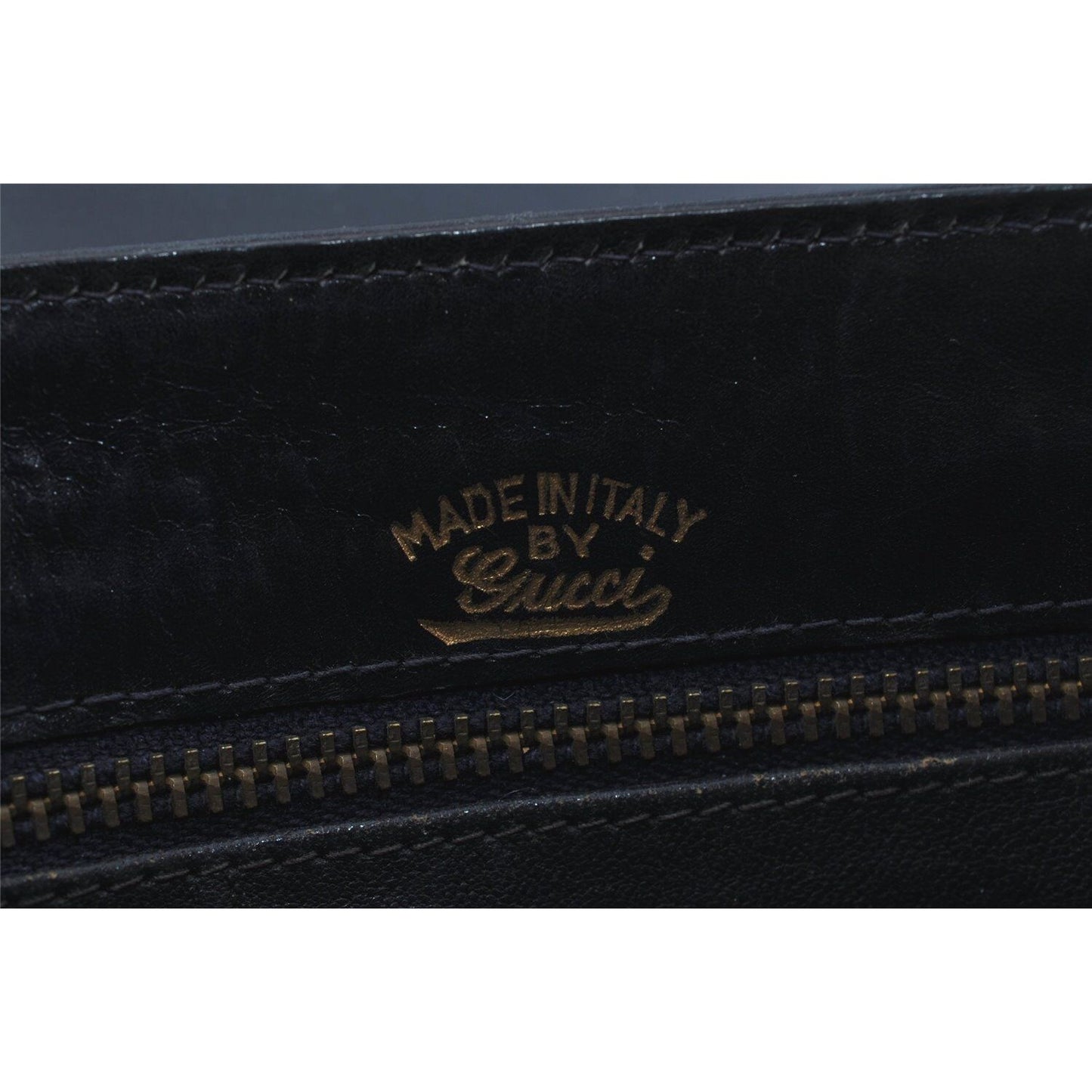 Gucci 1973 navy leather roomy handbag with a gold GG snap