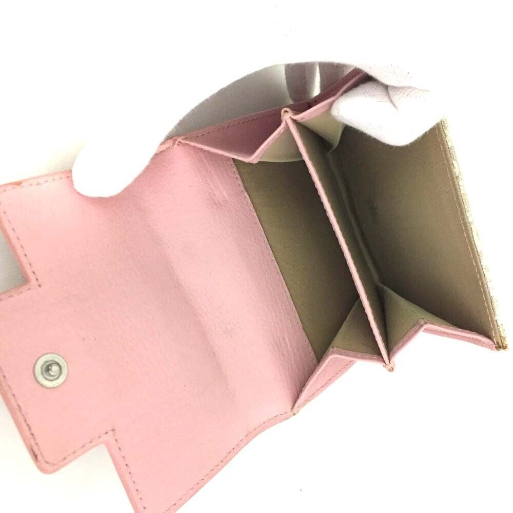 RARE, Christian Dior, pink lizard & tan canvas wallet w a white Diorissimo trotter print, a chrome 'Dior' plaque, & lots of slots for cards