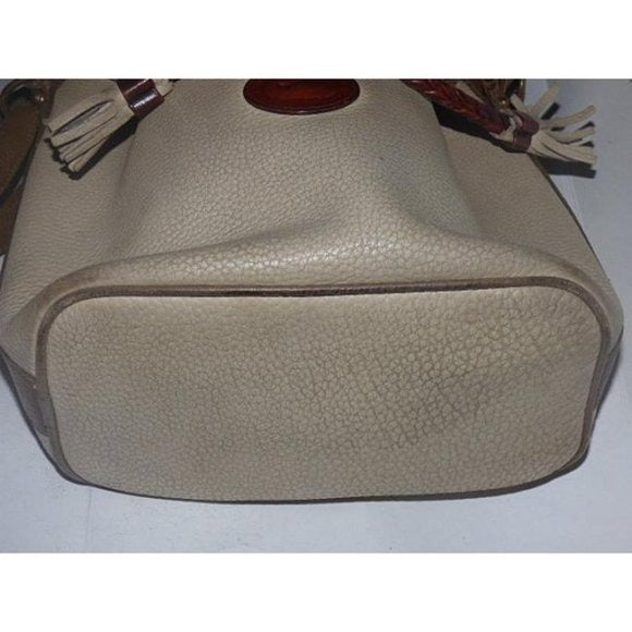 Early Dooney & Bourke, 'Teton' style, taupe, camel, brown leather, large, braided leather, drawstring top, cross body bag