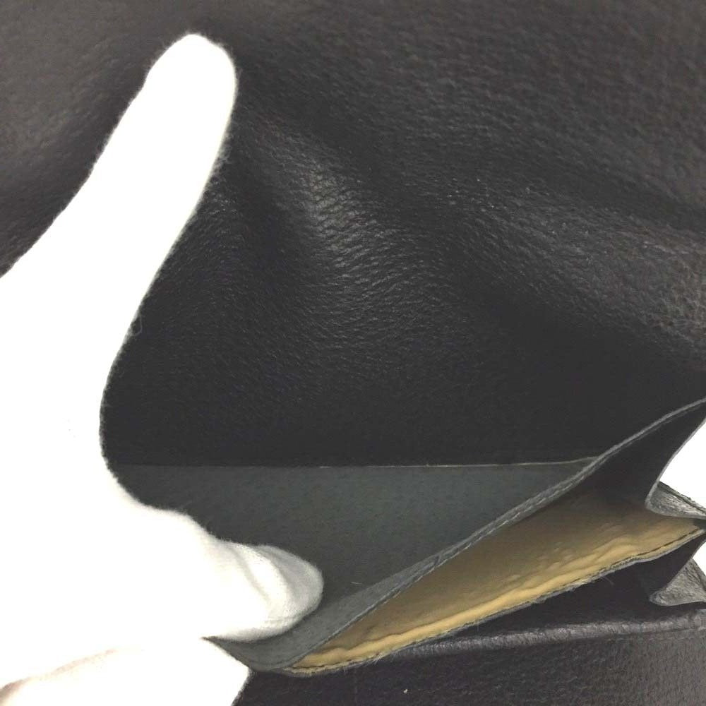 Unique, vintage, Gucci, RARE, black leather, clutch style purse or extra large wallet with a gold horse-bit accent at the clasp