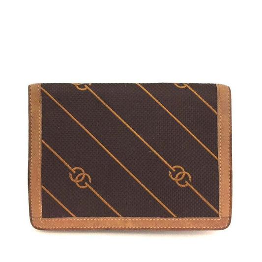 Early Gucci brown canvas with an orange diagonal GG logo print and camel leather bi-fold wallet