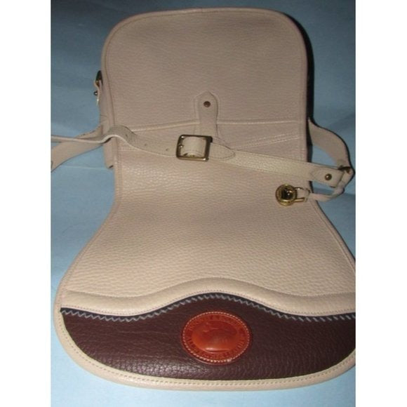 Dooney and Bourke Vintage Brown Ivory Saddle Bag