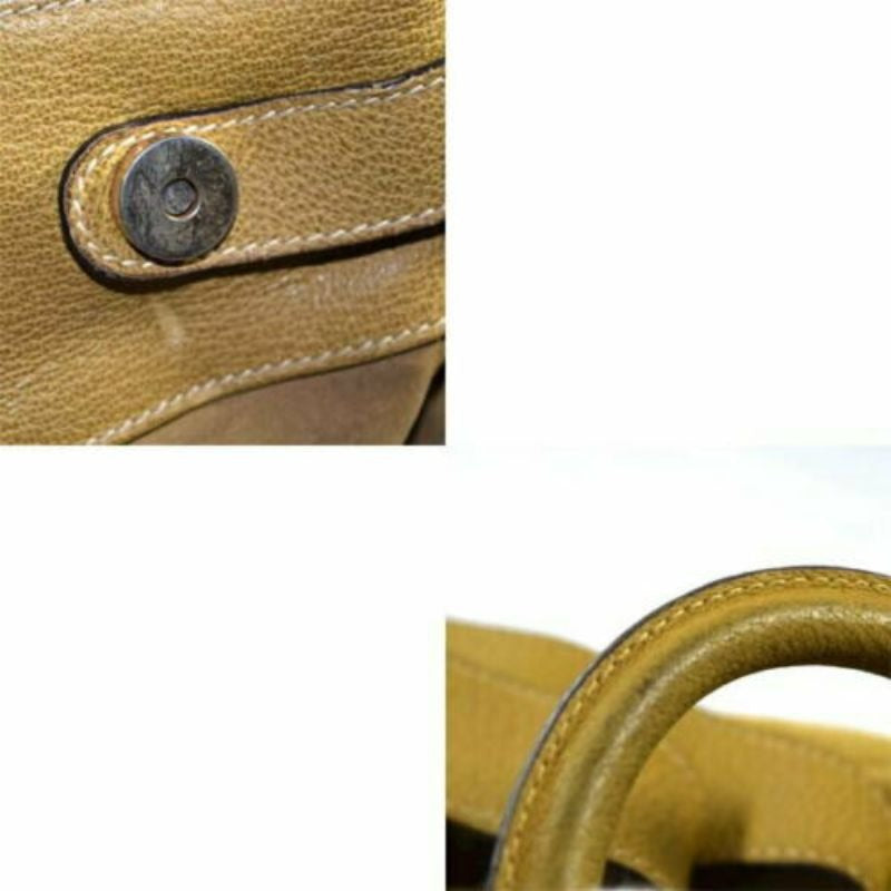 RARE, Gucci, Stirrup style camel suede and leather saddle bag top backpack or messenger bag with a gold stirrup accent