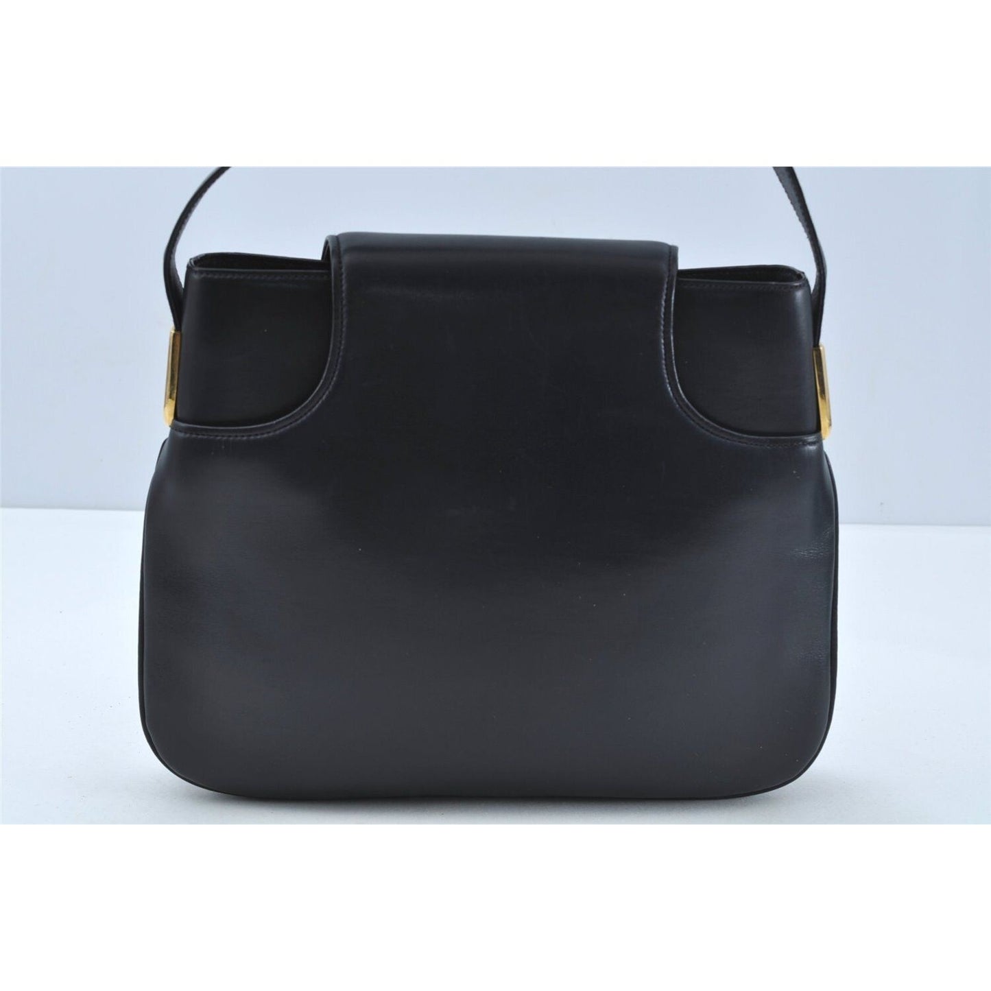 Gucci 1973 navy leather roomy handbag with a gold GG snap