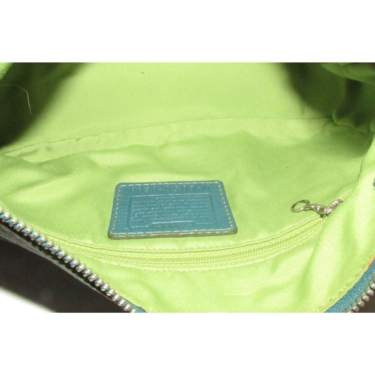 Coach, 'Chelsea' hobo, in a teal soft leather, hobo style purse with a brown, strap with unique chrome buckles