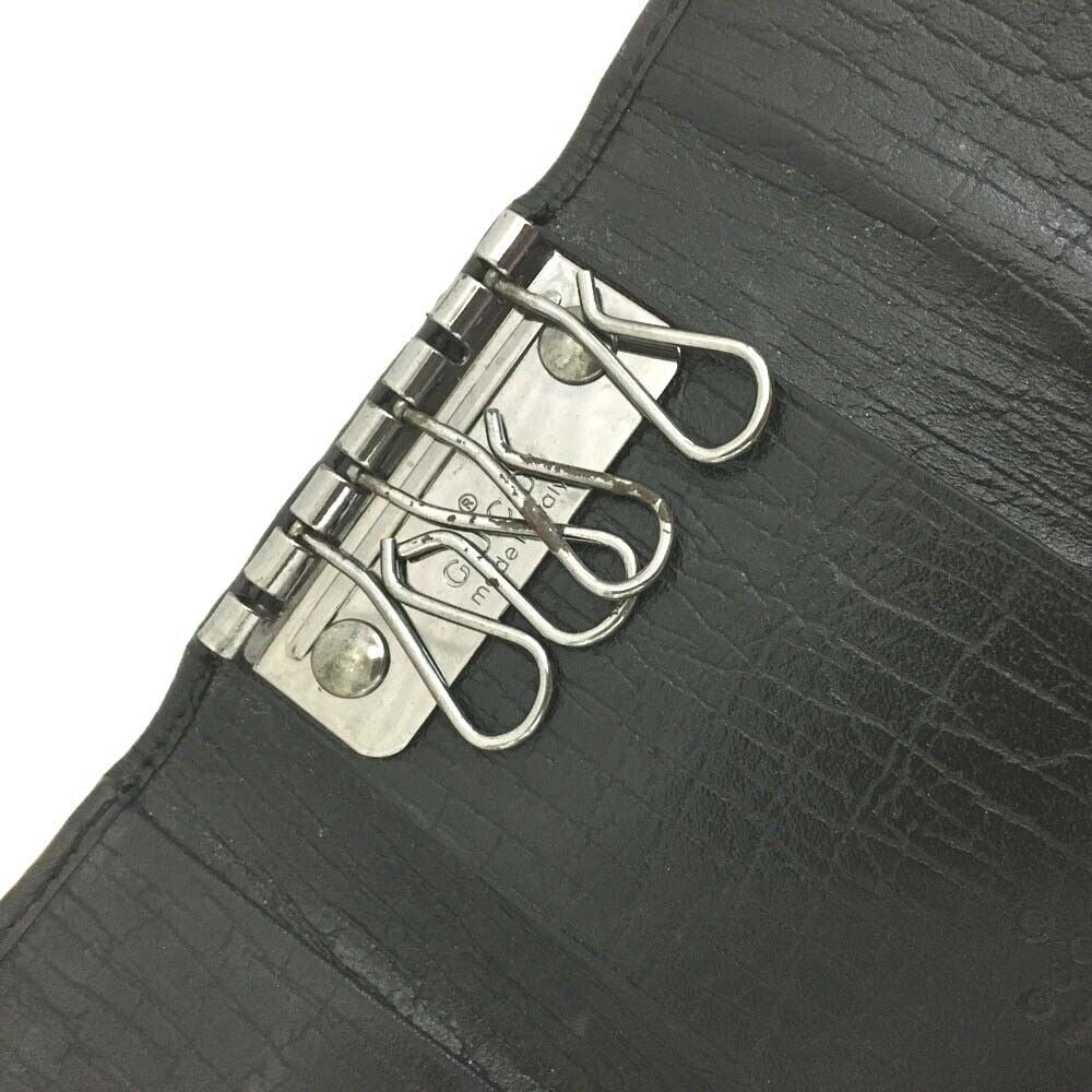 Gucci, black Guccissima print/leather, tri-fold, key holder/card holder, mini- wallet w bamboo accent & slots for your cards