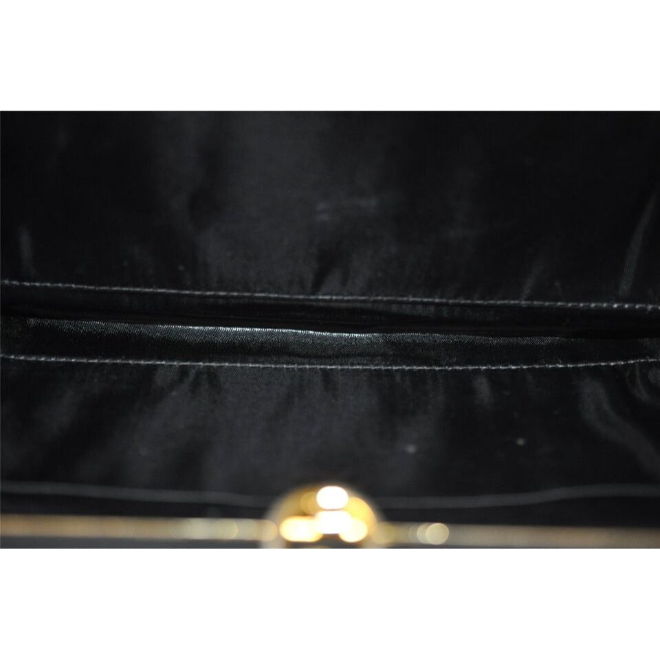 1960's Gucci mod black silk interlocking GG clutch purse