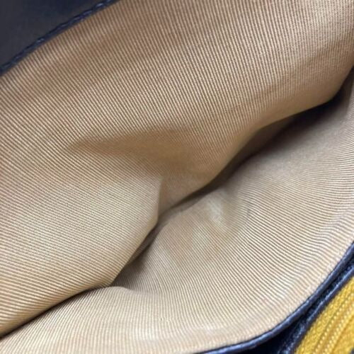 RARE, vintage, Dior, brown leather two-wy clutch/shoulder bag with a brown trotter print interior and accent that peeks through the front