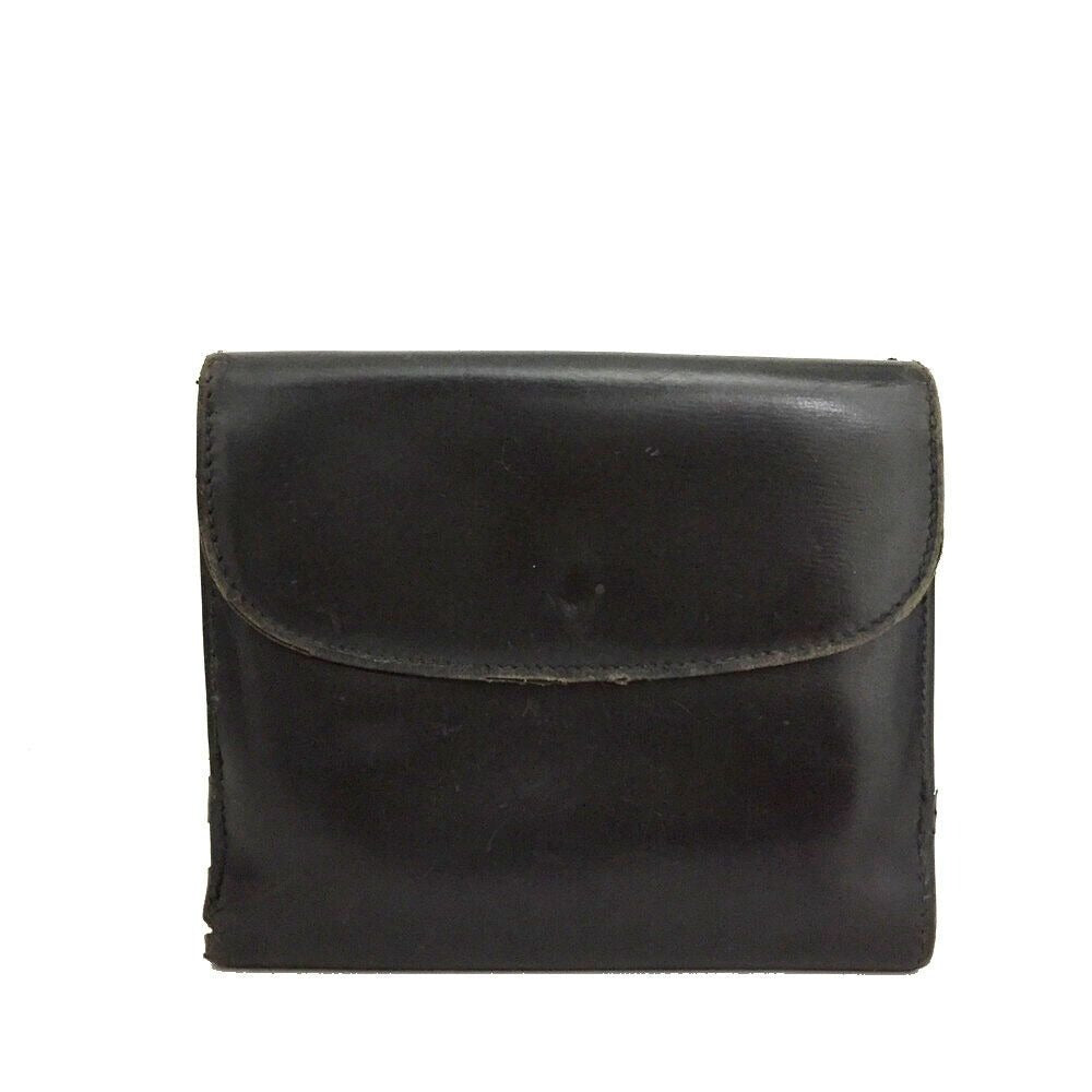 Gucci, black glossy leather, bi-fold style, rectangular, wallet with multiple pockets, tons of card slots, and a gold, hinged G clasp