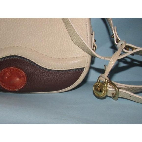 Dooney and Bourke Vintage Brown Ivory Saddle Bag