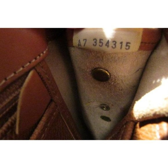 Dooney and Bourke Beige Pebbled Shoulder Bag