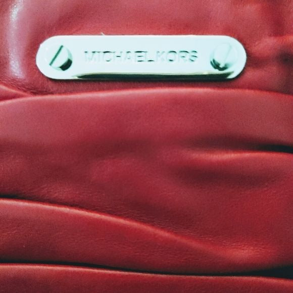 Michael Kors, red ruched leather, expandable clutch with chrome hardware & exterior pockets