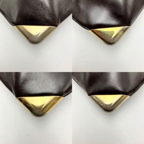 RARE, vintage, Dior, brown leather two-wy clutch/shoulder bag with a brown trotter print interior and accent that peeks through the front