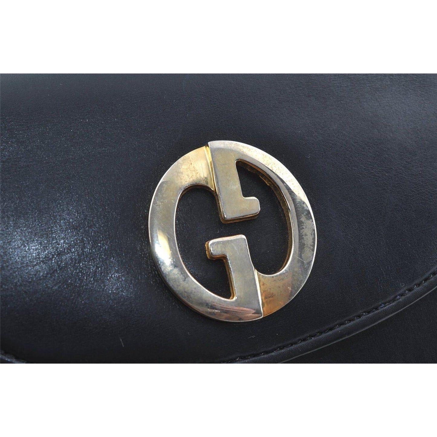 Gucci 1973 navy leather roomy handbag with a gold GG snap