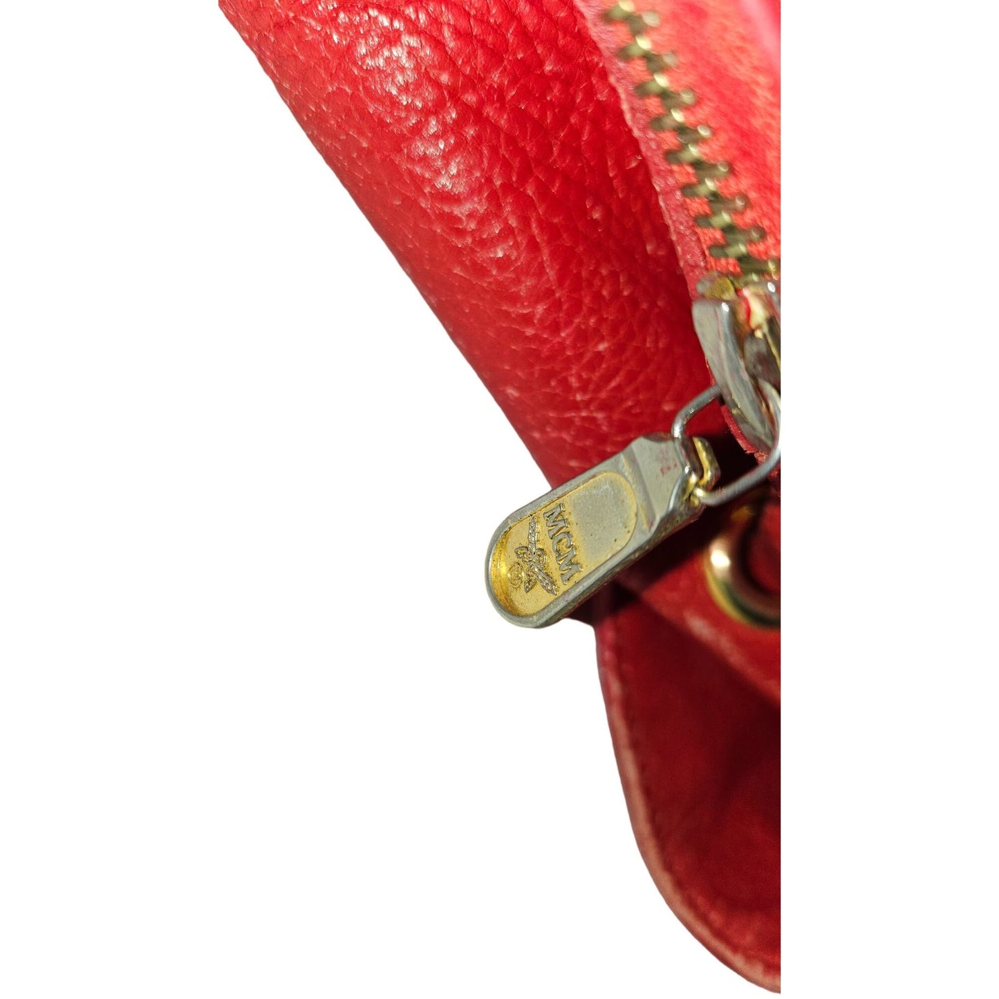 MCM vintage red leather backpack with gold hardware