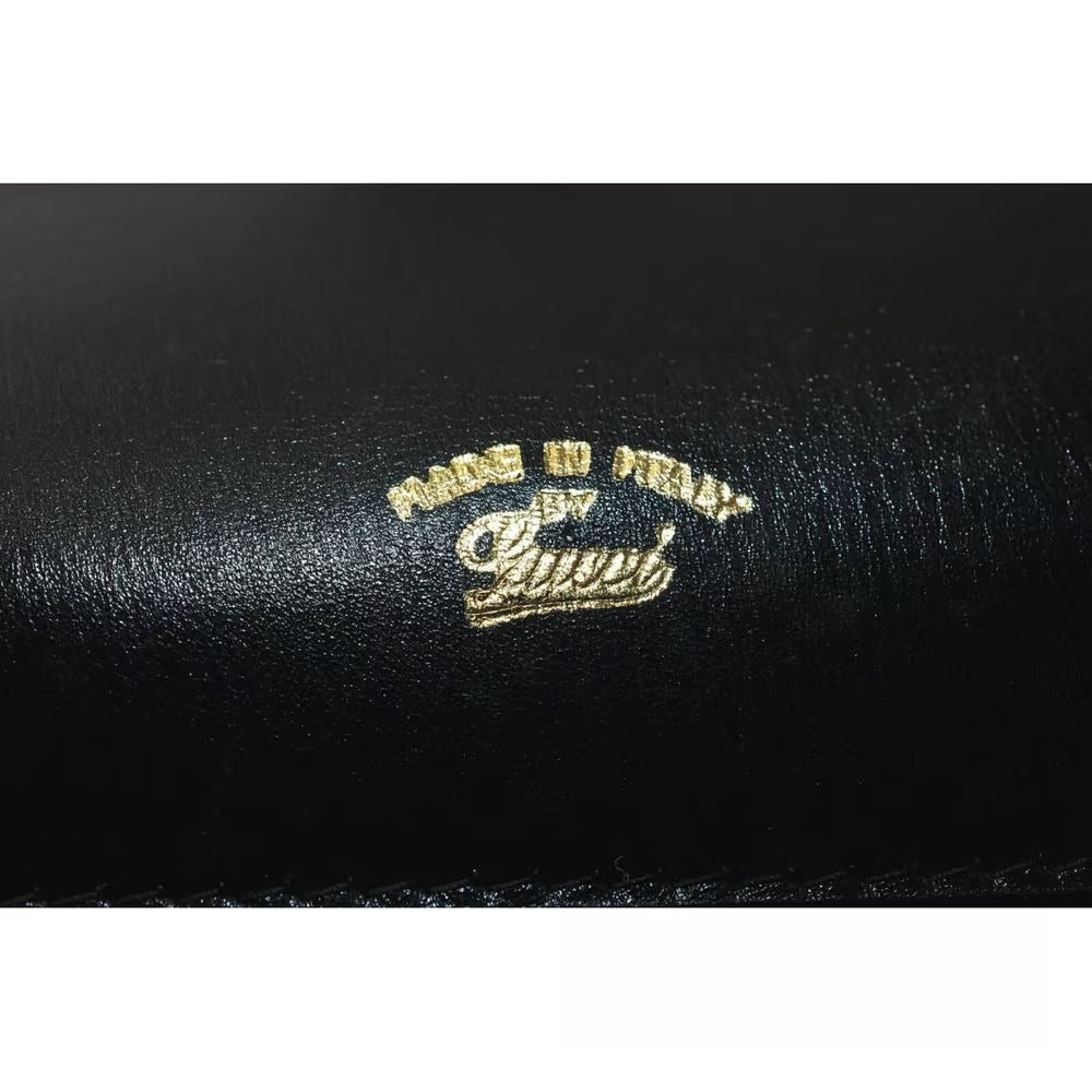 Unique 1960s Gucci mod, black leather, shoulder bag with a beautiful, blue, lapis lazuli accent on the clasp & bold gold hardware