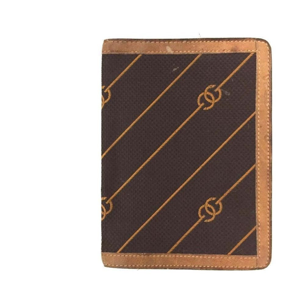 Early Gucci brown canvas with an orange diagonal GG logo print and camel leather bi-fold wallet