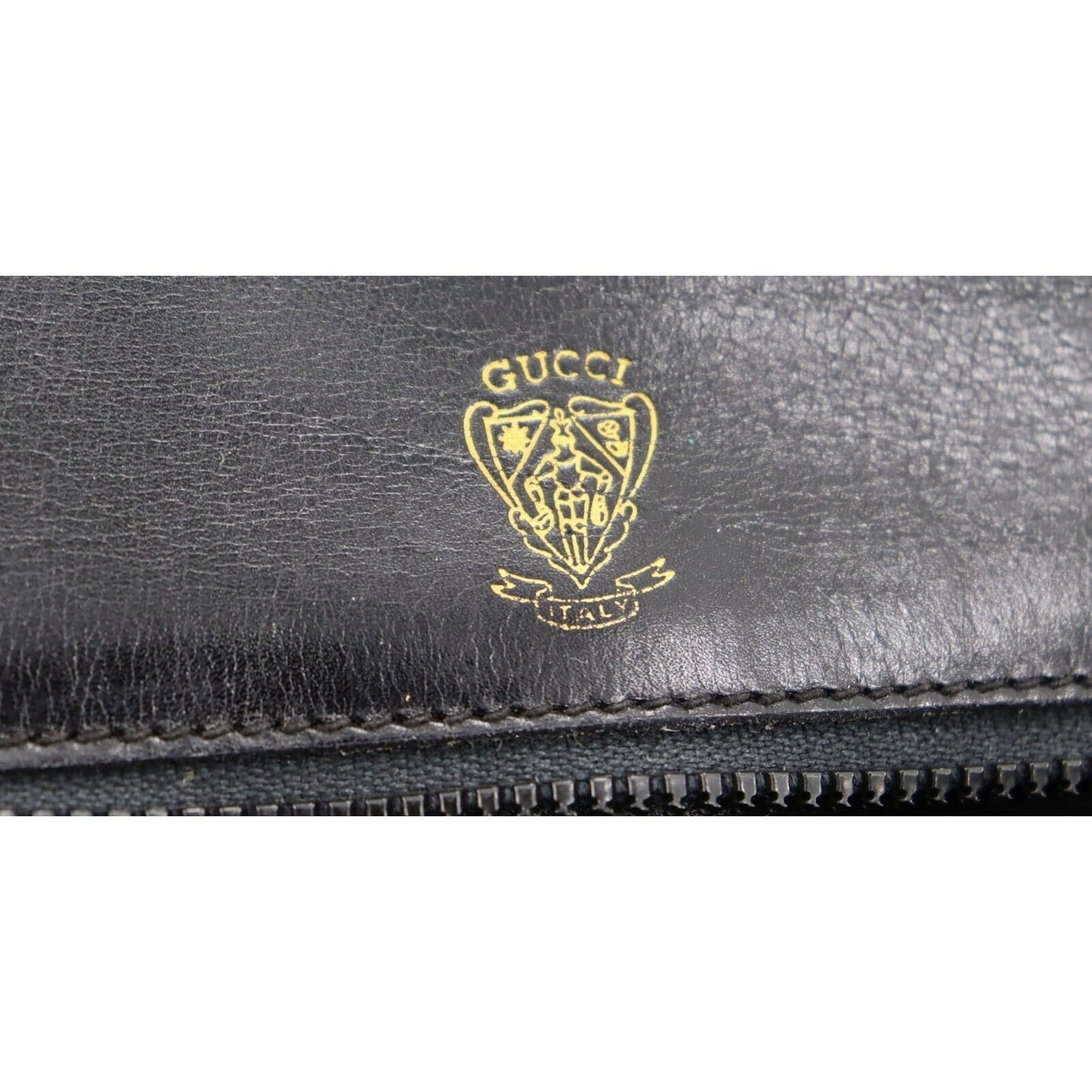 Vintage, navy leather, Gucci shoulder bag with XL gold & tan leather horsebit accent with cut-out & 'GUCCI' engraved on top
