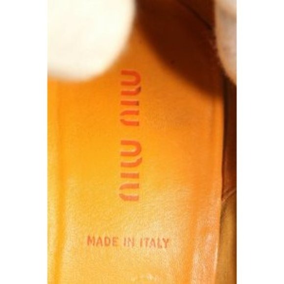 Miu Miu, size EU 39.5/9.5B US, khaki canvas and orange leather, squared, pointy toe, heels with 2" kitten heels, square, orange leather and chrome buckles, wood look heels, and chrome hardware