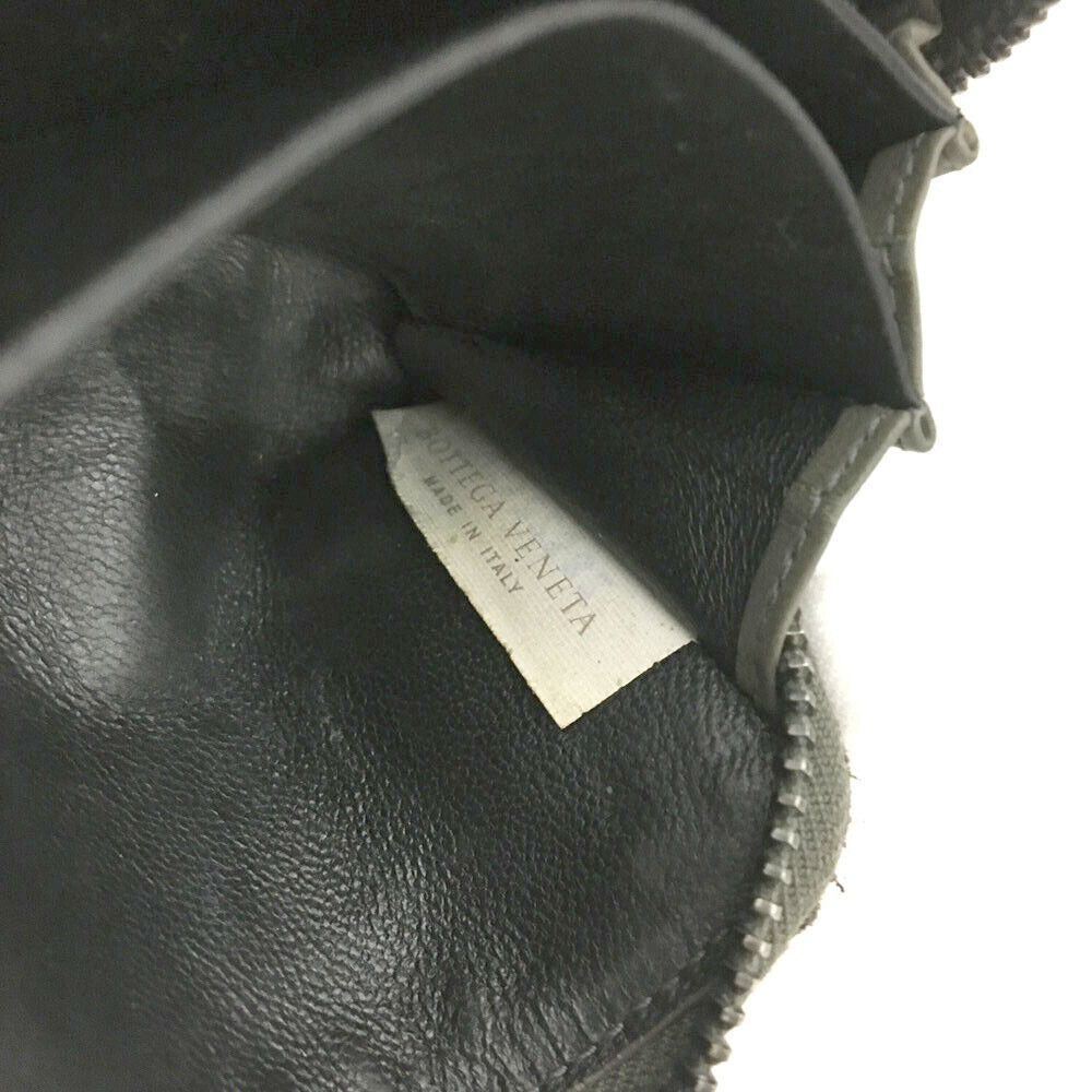 Bottega Veneta, grey intrecciato leather wallet with three compartments and a zip around style!