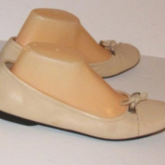 Prada Pink Beige Leather Ballet Flats with an Almond Toe and Bow with Chrome Accents