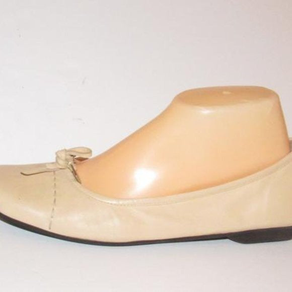 Prada Pink Beige Leather Ballet Flats with an Almond Toe and Bow with Chrome Accents