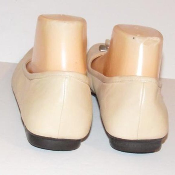 Prada Pink Beige Leather Ballet Flats with an Almond Toe and Bow with Chrome Accents